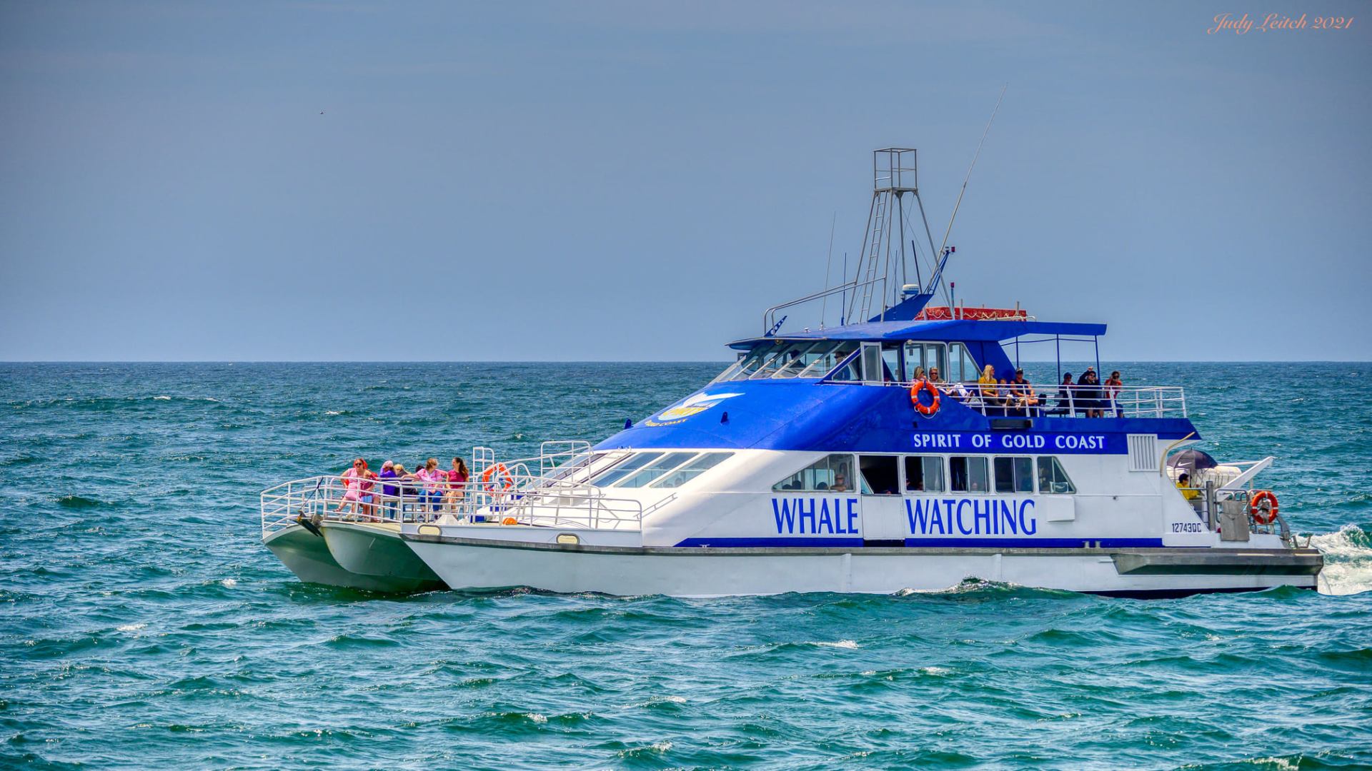 a small boat in a large body of water