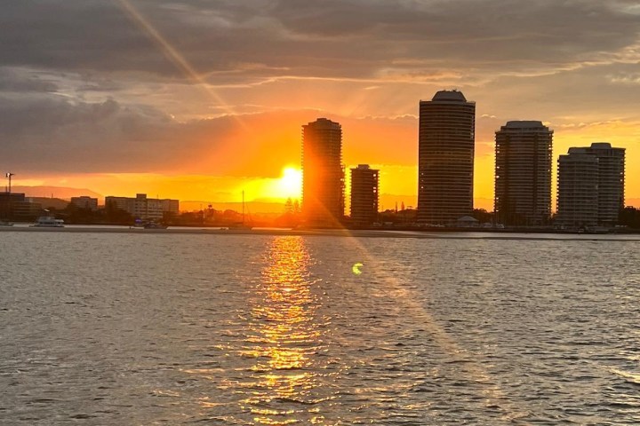 a sunset over a body of water