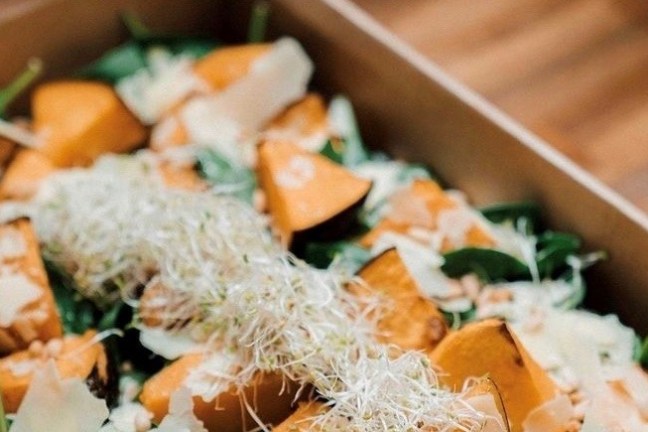 a dish is filled with food