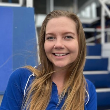 a woman in a blue shirt